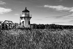 Doubling Point Lighthouse Tower Near Marsh Grass -BW